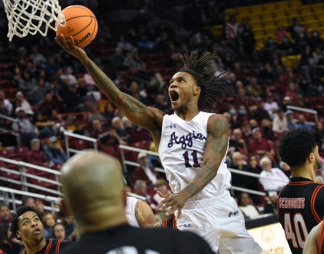 DaJuan Gordon goes in for an uncontested layup on Saturday afternoon as the Aggies took on Sam Houston State at the Pan American Center.